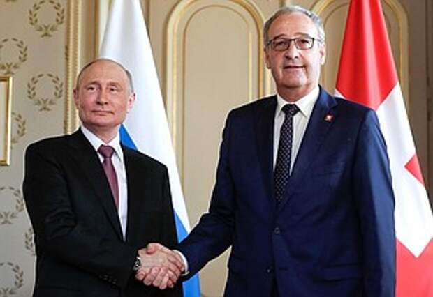 С Президентом Швейцарии Ги Пармеленом.