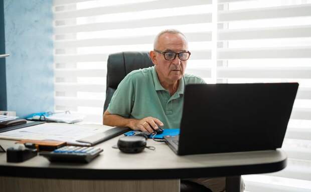 A person at a laptop.