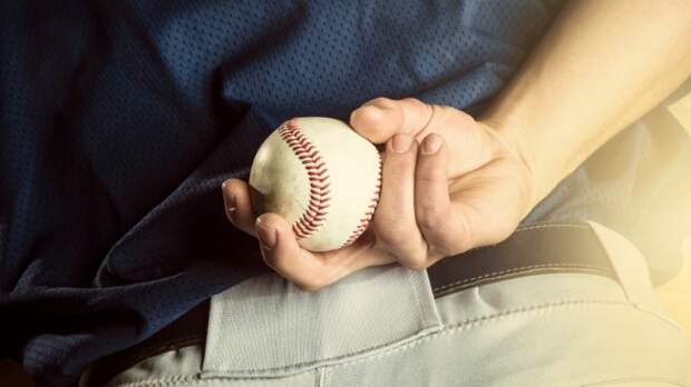 A pitcher prepares to throw a pitch.