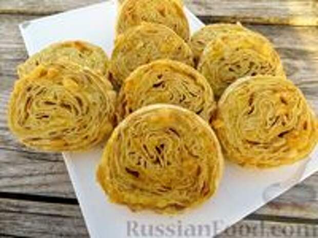 Фото к рецепту: Рулетики из лаваша с картофелем и сыром (в духовке)