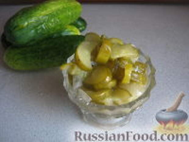 Фото к рецепту: Салат «Нежинский» из огурцов на зиму