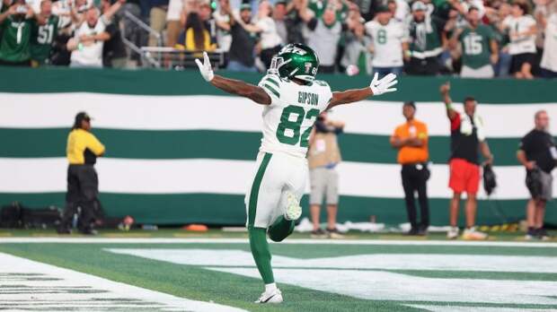 Xavier Gipson celebrates a game-winning punt return.