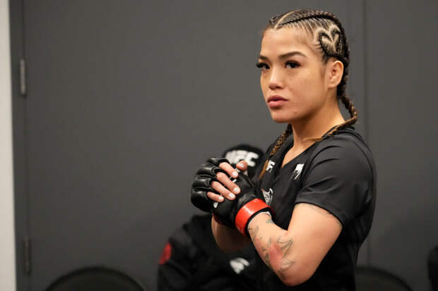 Tracy Cortez working out on the mat