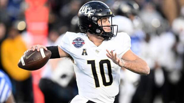 QB John Rhys Plumlee throws a pass in UCF's bowl game.