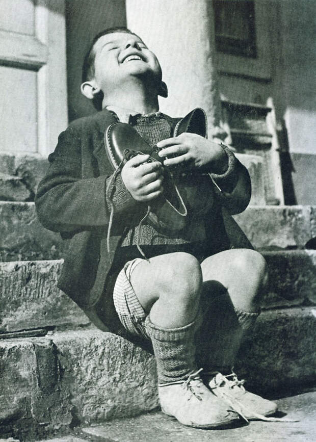 Austrian Boy Receives New Shoes During WWII