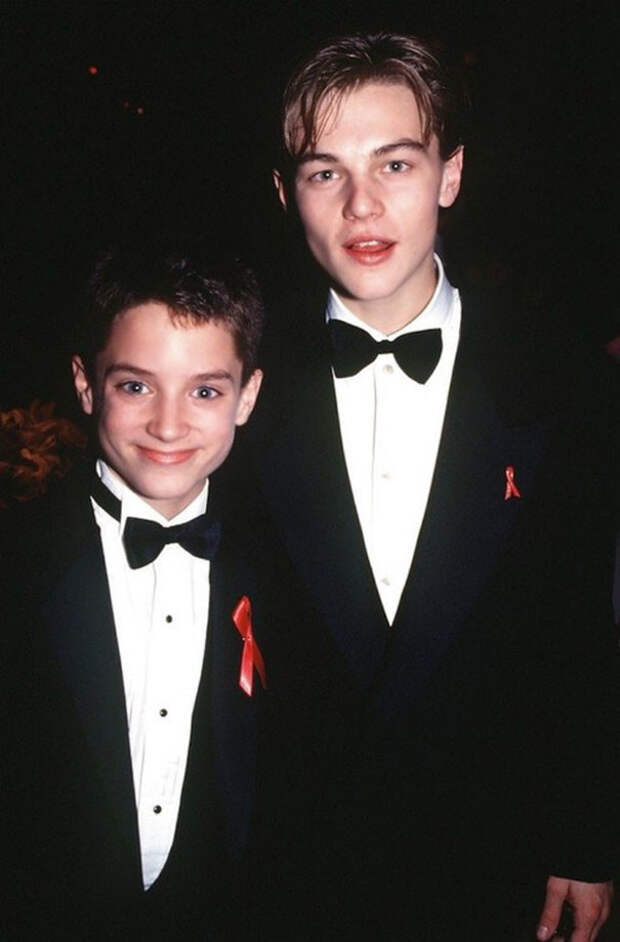 8. Элайджа Вудс (13 лет) и Лео ДиКаприо (20 лет) на 66-й церемонии вручения премии Оскар (1994) знаменитости, редкие фотографии