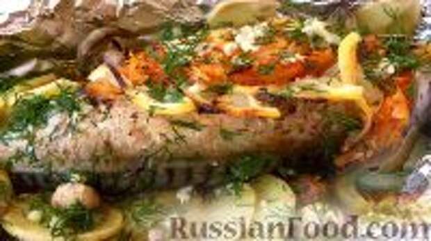 Фото к рецепту: Фаршированная скумбрия, запеченная в духовке