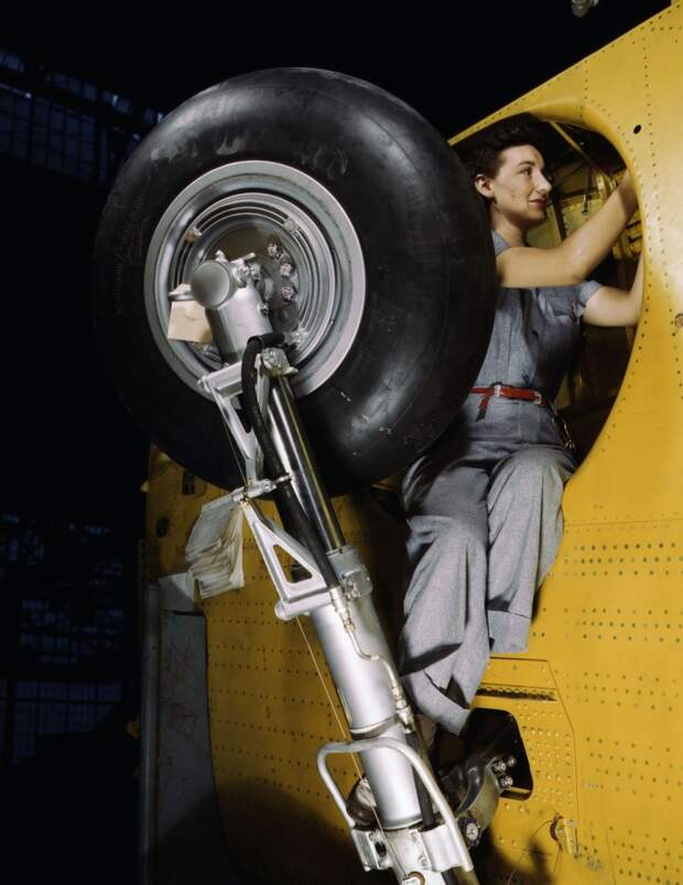 Alfred Palmer - Woman Working on a Bomber's Wheel Well, 1943 Alfred Palmer - Woman Working on a Bomber's Wheel Well, 1943