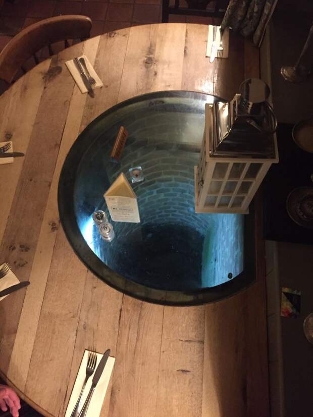 The Table At This Pub Has A Well In The Middle Of It (England)