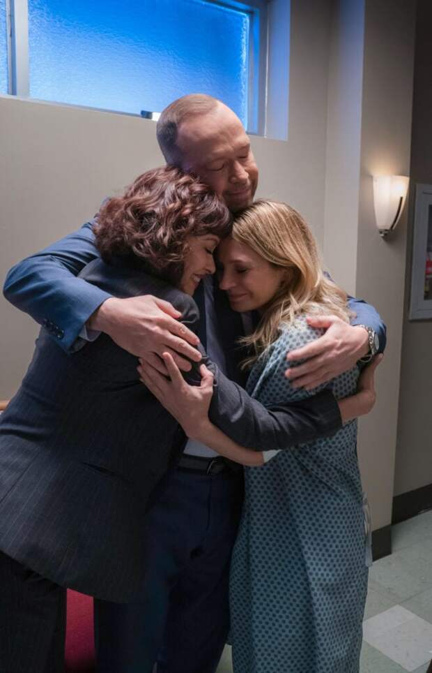 Danny hugging Erin and Baez during a final shot for Blue Bloods Season 14 Episode 18