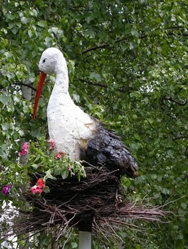 Декоративное гнездо аиста фото