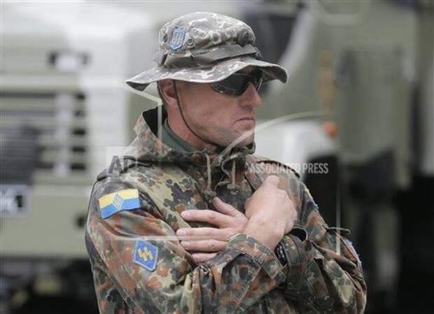 Снимок, сделанный для Associated Press фотографом Ефремом Лукатским 30 сентября 2014 года в Славянске.