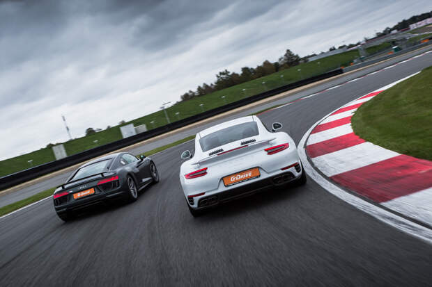 Битва года: Porsche 911 Turbo S vs Audi R8 V10 plus. Фото 3