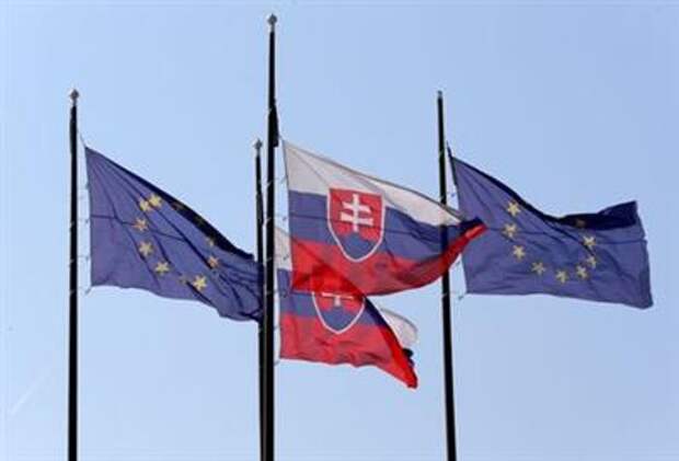 European Union and Slovakian flags are seen outside the Bratislava Castle (Hrad) in Bratislava, Slovakia, September 15, 2016. REUTERS/Yves Herman