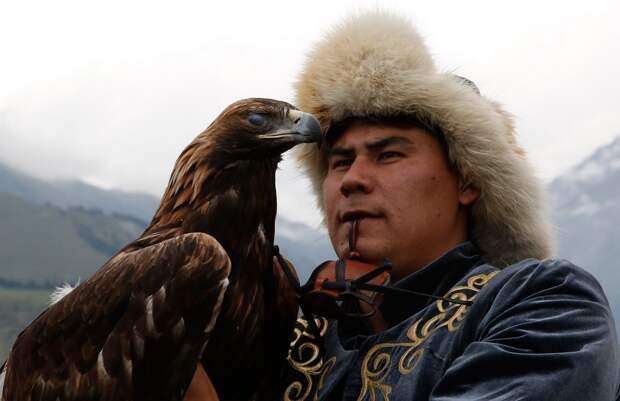 KYRCHYN GORGE,, KYRGYZSTAN - SEPTEMBER 4: An eagle hunter with his bird at the World Nomad Games on September 4, 2016 in Cholpon-Ata, Kyrgyzstan. Kyrgyzstan is hosting the second World Nomad Games dedicated to the sports of Central Asia. Over 40 countries are taking part. (Photo by Olivia Harris/Getty Images)