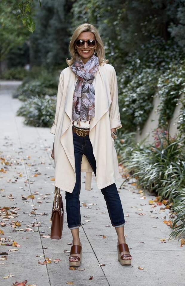 Looking Chic In Our Butter Cascading Collar Belted Duster Coat