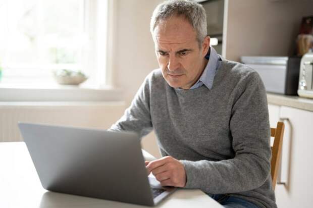 A person at a laptop.
