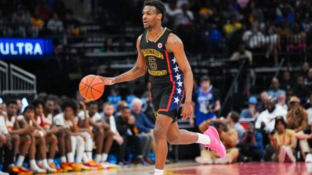 Bronny James dribbles the ball at the McDonald's All-American Game.