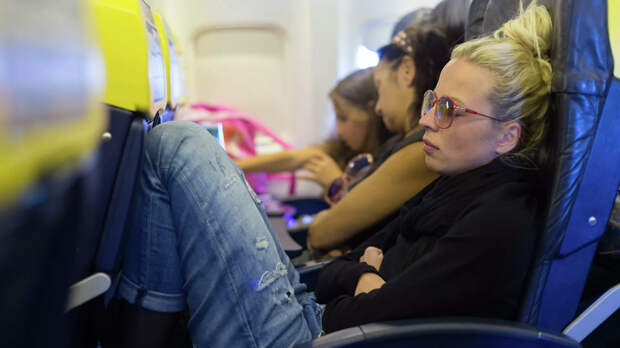 Женщина в салоне самолета Женщина в салоне самолета - РИА Новости, 1920, 15.10.2020