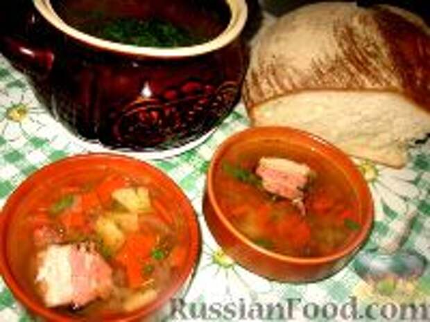 Фото к рецепту: Овощной суп с копченой грудинкой в горшке