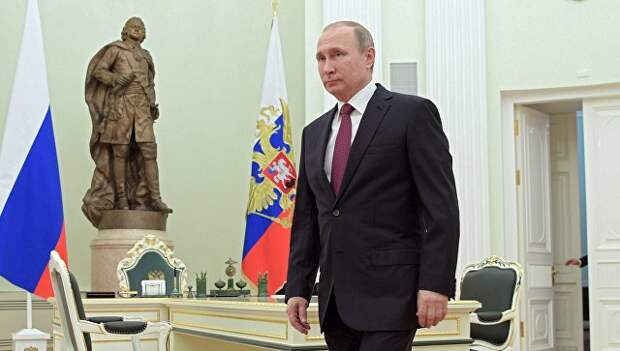 Президент РФ Владимир Путин перед началом встречи в Кремле с президентом Молдовы Игорем Додоном. 17 января 2016 Президент РФ Владимир Путин перед началом встречи в Кремле с президентом Молдовы Игорем Додоном. 17 января 2016