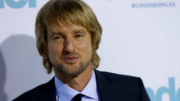 Cast member Owen Wilson poses at the premiere for