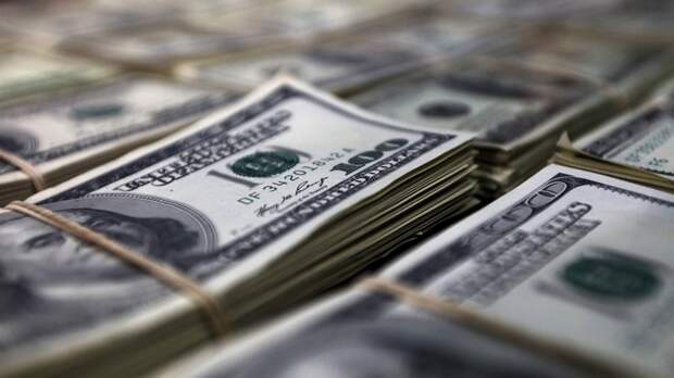 Telegraph: из-за агрессивной политики Вашингтона доллар теряет свои позиции