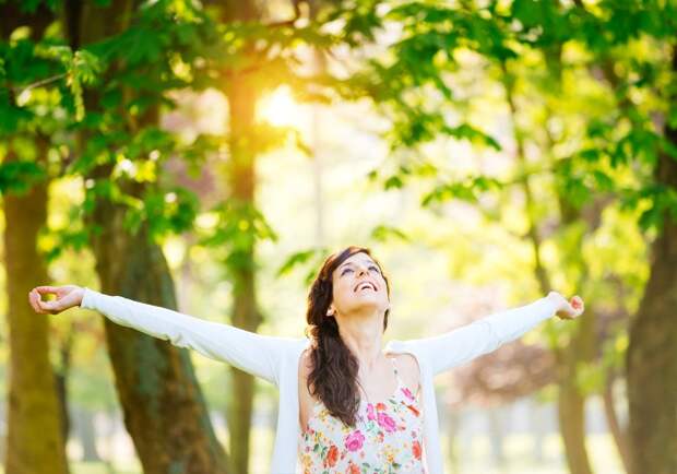 Woman enjoying happiness and hope on spring