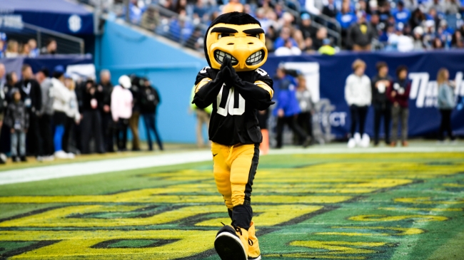 The Iowa Hawkeyes mascot celebrates at a bowl game.