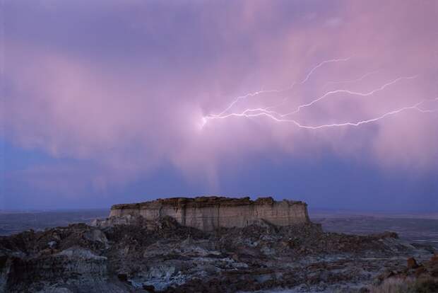 Lightning flashes over a butte in Adobe Town, Wyoming. This photo appeared in a July 2005 story about the battle over natural gas drilling in the Rockies.