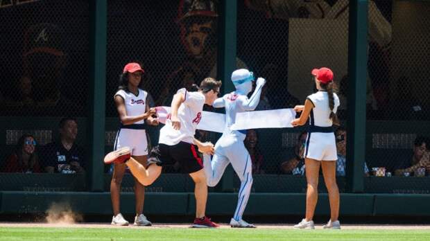 The Freeze races an Atlanta Braves fan.