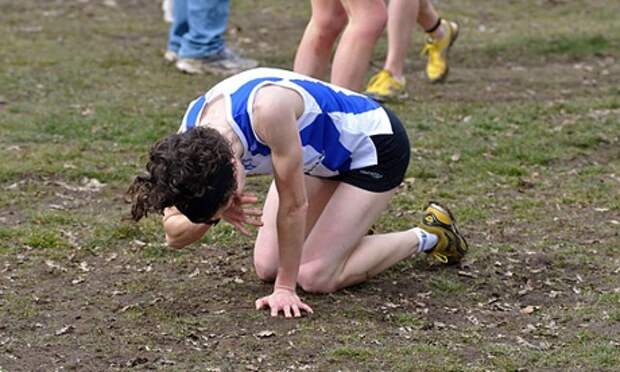 An exhausted cross-country runner in Cofton Park, Birmingham.