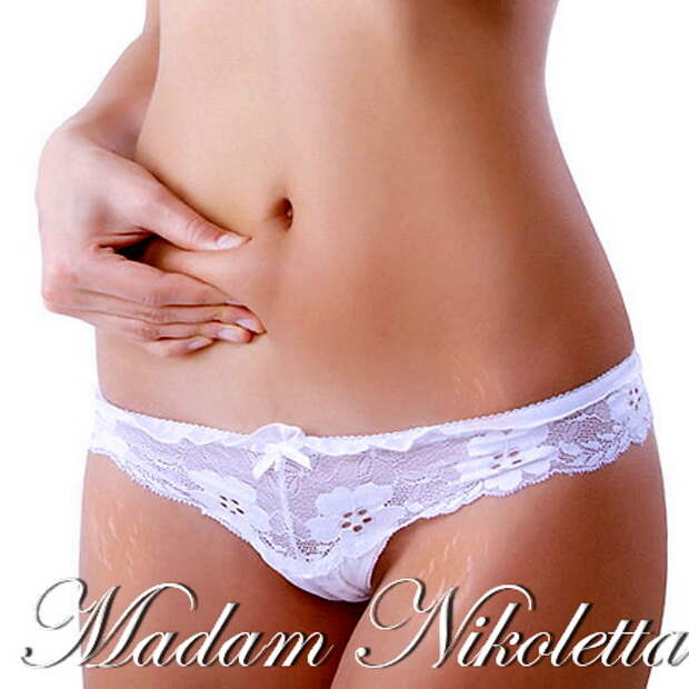 woman showing cellulite on her belly