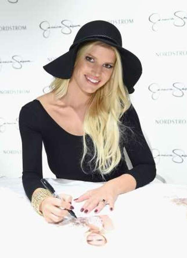Jessica Simpson wearing Jessica Simpson Collection  attends Jessica Simpson Collection Fashion Show at Nordstrom on September 20, 2014 in Los Angeles, California.