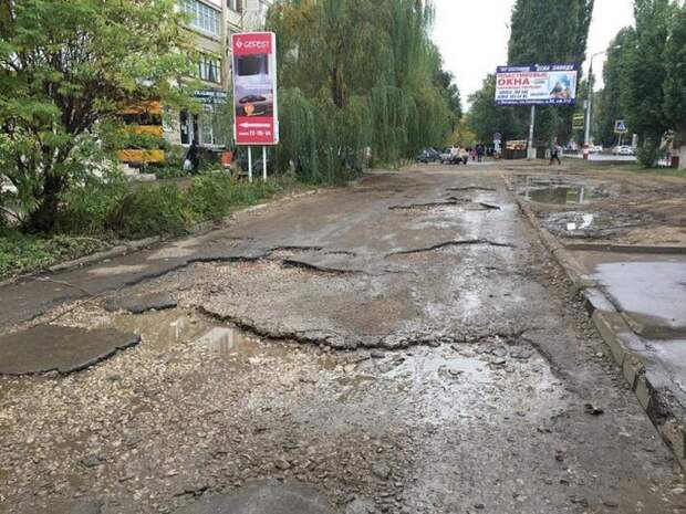 Работы фотоконкурса «Убитые дороги» (15 фото)